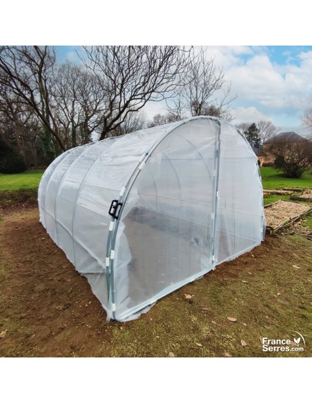 Serre tunnel de jardin avec 2 portes sur charnières et bâche thermique 12m²