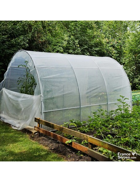 Serre tunnel de jardin de 9m² avec porte enroulable et pignon plein